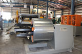 Metal expanding and slitting machine