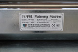 Expanded mesh flattening machine