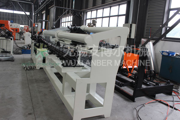 Automatic chain link fence machine