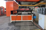 Expanded mesh leveling and cutting machine